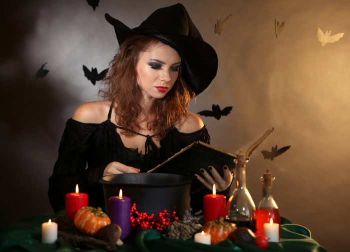 Halloween witch on dark background